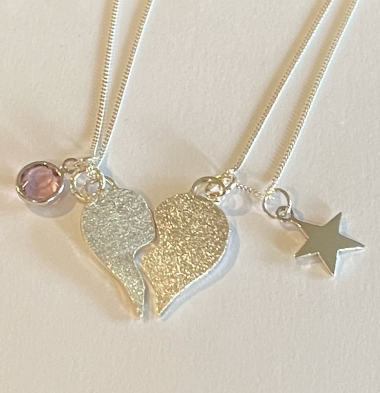 Two hearts as one pendant