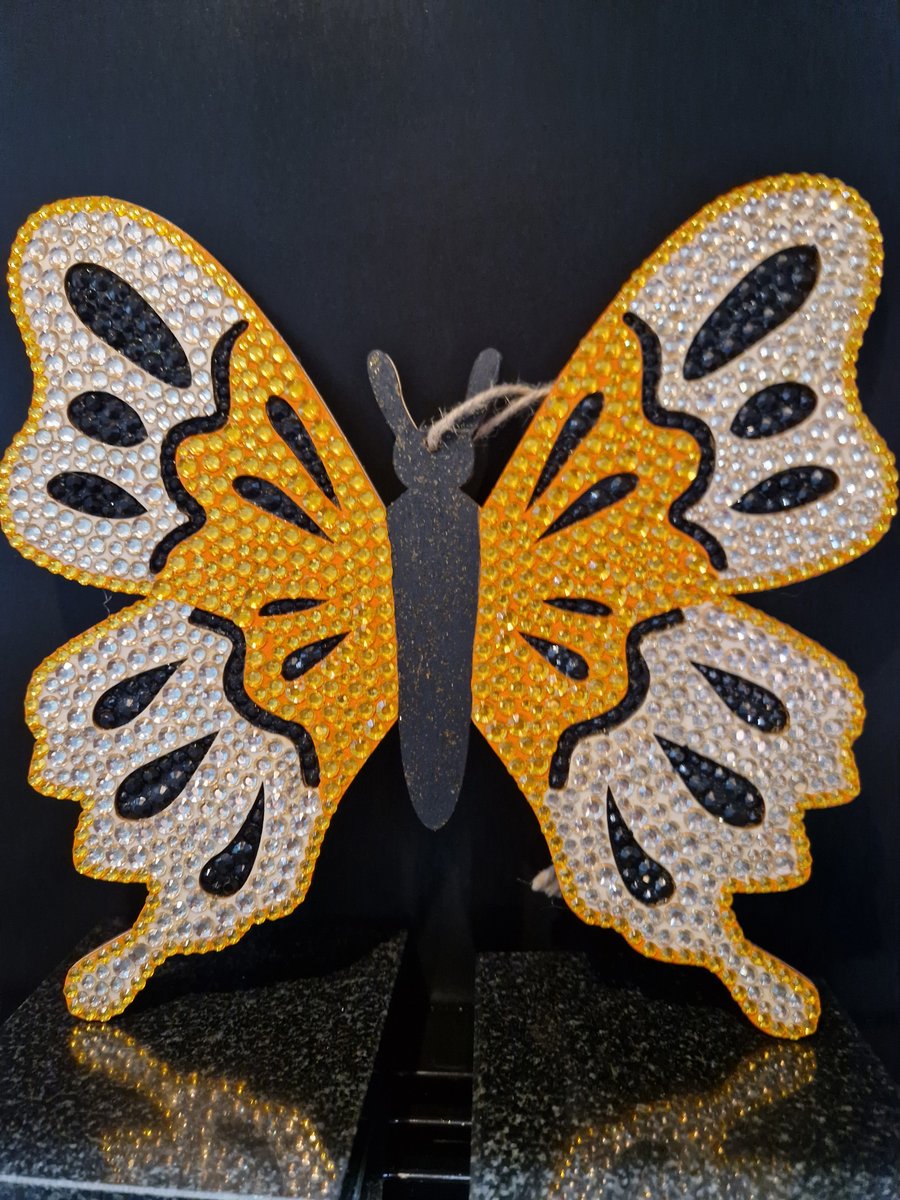 Golden wooden butterfly. 