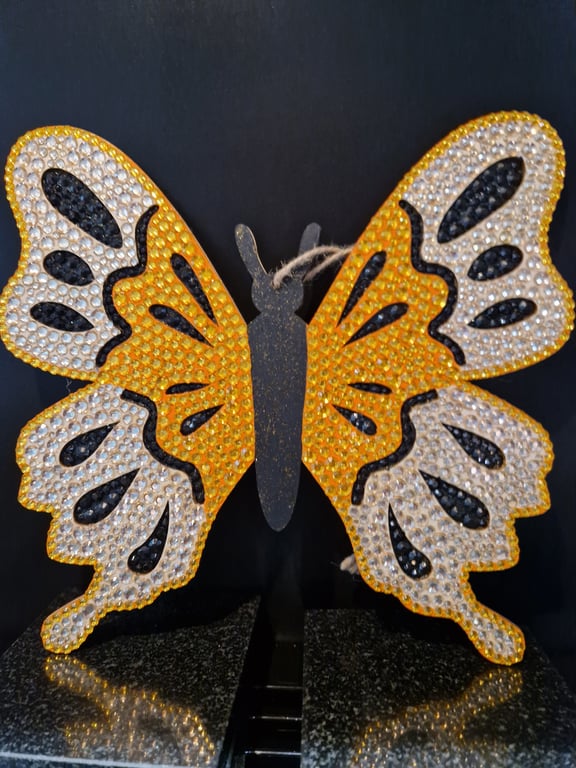 Golden wooden butterfly. 