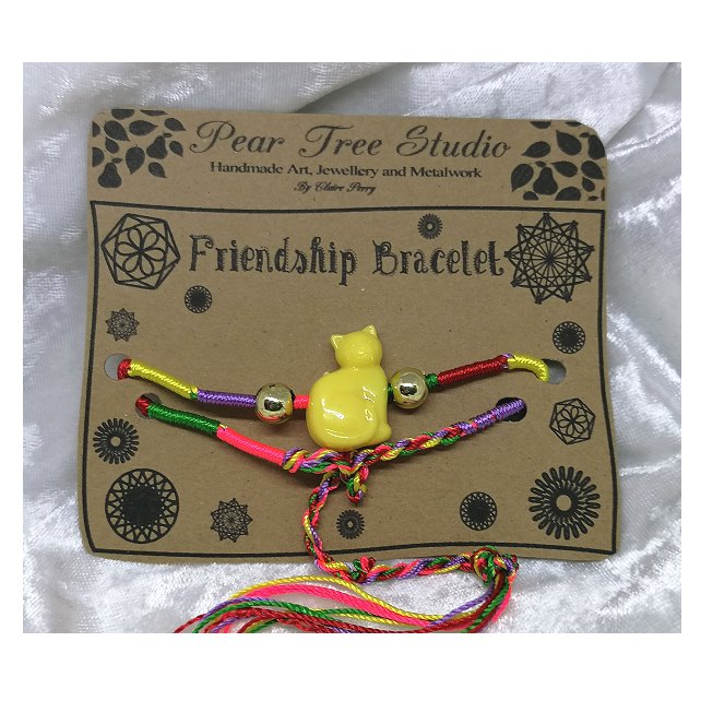 Friendship bracelet with Yellow Cat bead.