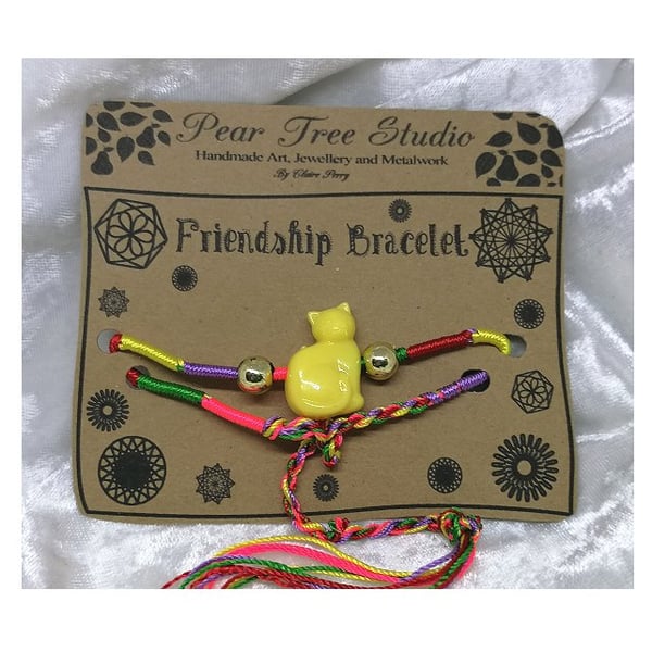 Friendship bracelet with Yellow Cat bead.