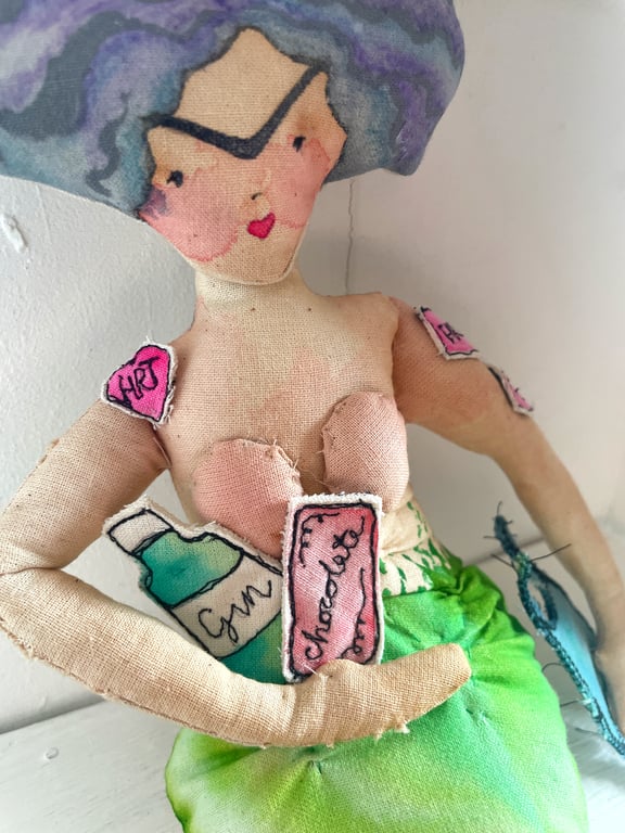 Mernapause: a menopausal mermaid art doll of a certain rage