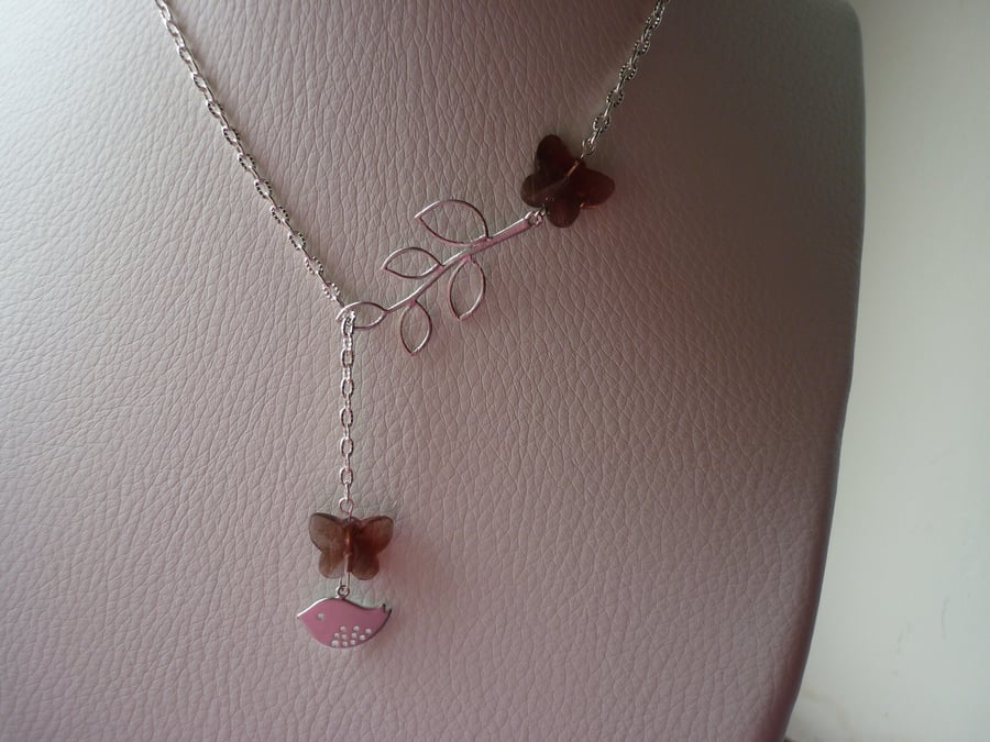 AMETHYST AND SILVER, BUTTERFLY, BIRD AND LEAF LARIAT DESIGN NECKLACE. 