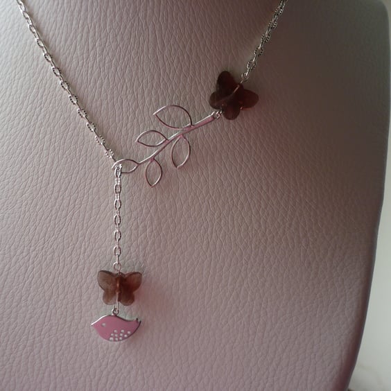 AMETHYST AND SILVER, BUTTERFLY, BIRD AND LEAF LARIAT DESIGN NECKLACE. 