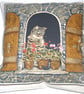 Lovely Grey Tabby cat sitting in window cushion - Image 1