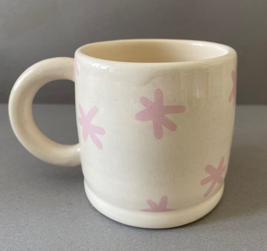 Pink abstract shape ceramic cup.