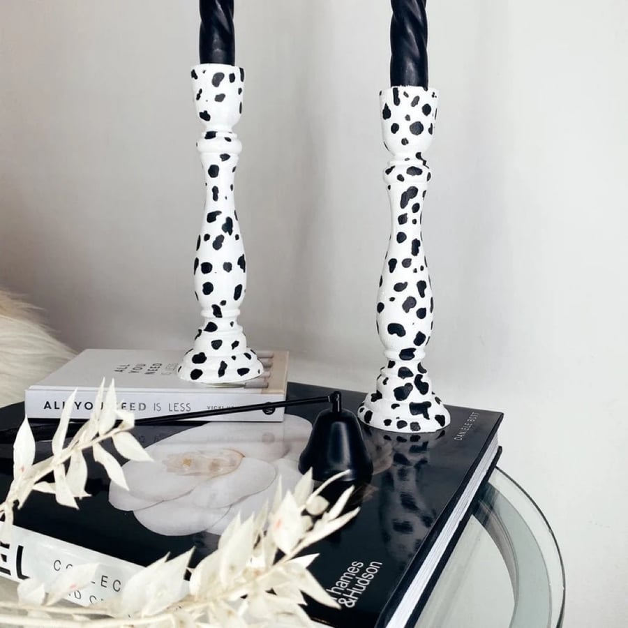 A Pair Of Dalmatian Print Candle Sticks