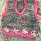 Hand knitted baby tank top with fairisle bunnies