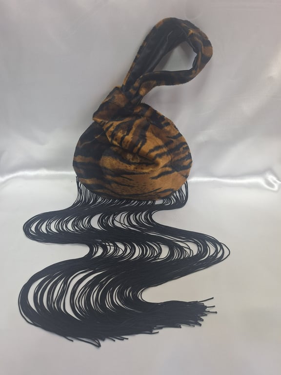 Tiger print faux fur fabric Japanese Knot bag with 48cm black tassel trim 