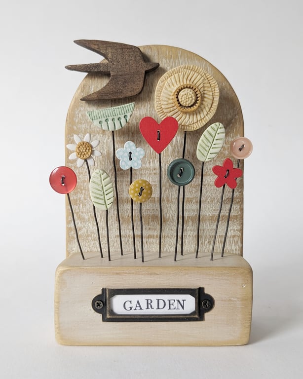 Wildl Flower Garden with Bird in Wood and Clay