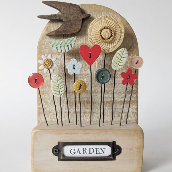 Wildl Flower Garden with Bird in Wood and Clay