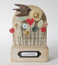 Wildl Flower Garden with Bird in Wood and Clay