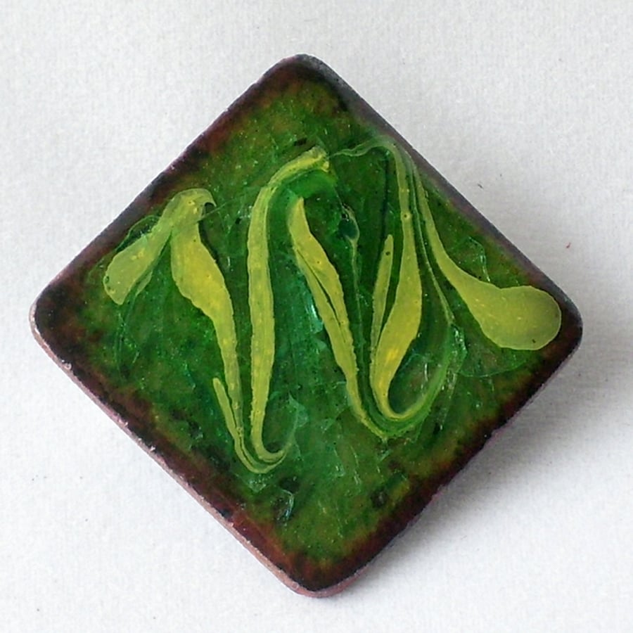 brooch - square, scrolled yellow on green over clear enamel