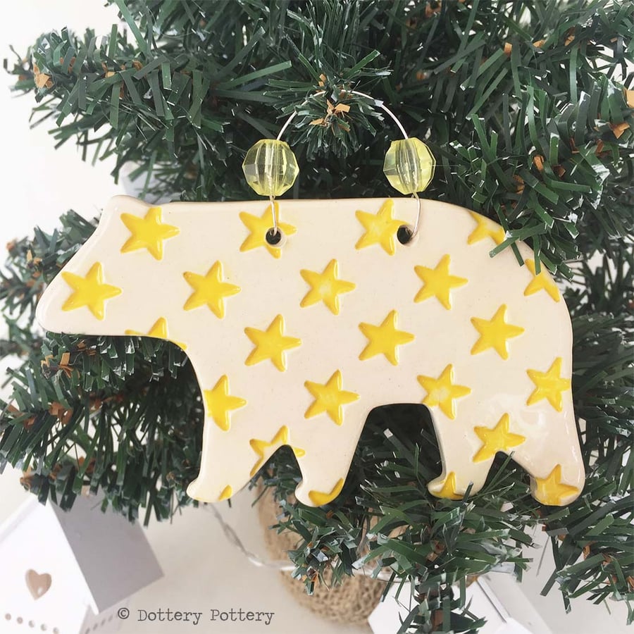 Ceramic Polar Bear with yellow star design. Pottery Christmas decoration bear