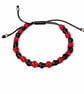 Bracelet, black and red rose buds, macrame and beads