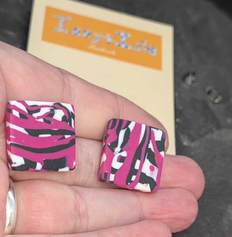 Artisan square stud earrings, yellow black and white abstract design.