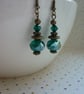 GREEN & ANTIQUE BRONZE DANGLE EARRINGS.  1035 - Image 2