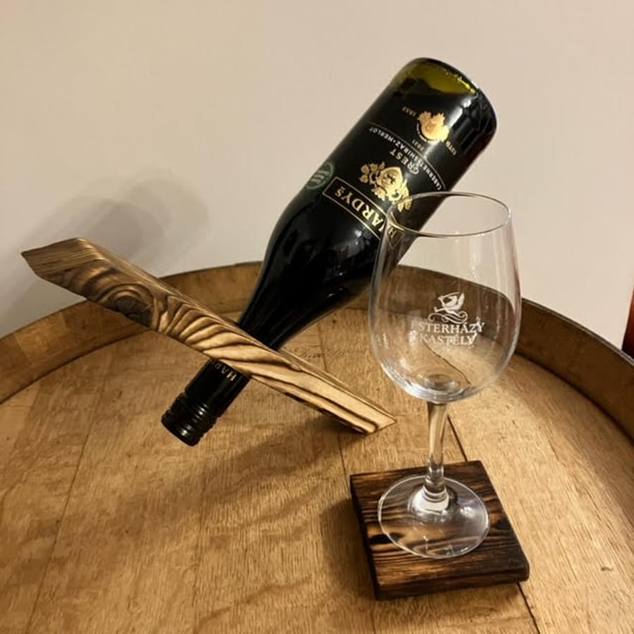 Rustic gravity wine bottle holder