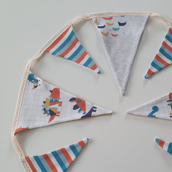 Stripey Dinosaur Bunting on Cream Binding