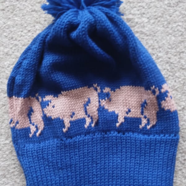 Pig bobble hat for a child with pigs motifs. Machine washable wool, any colour