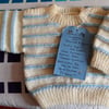 Baby Jumper with shoulder fastenings.