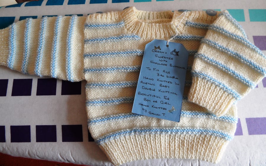 Baby Jumper with shoulder fastenings.