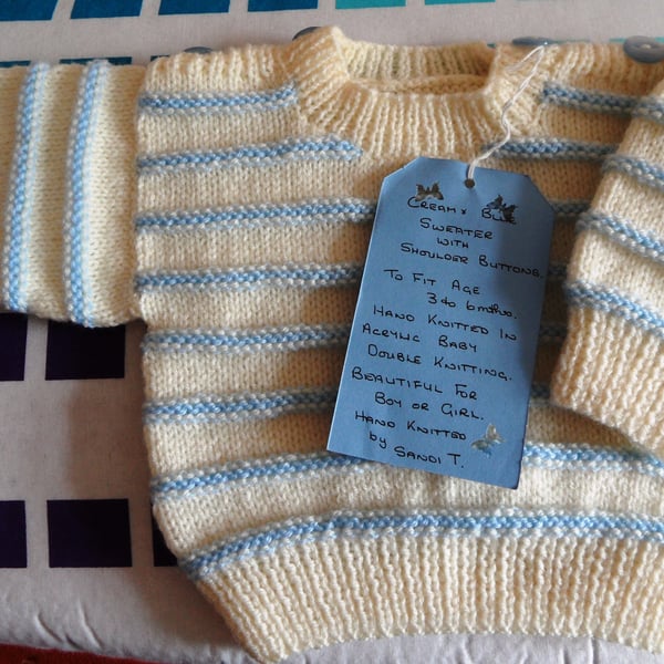 Baby Jumper with shoulder fastenings.