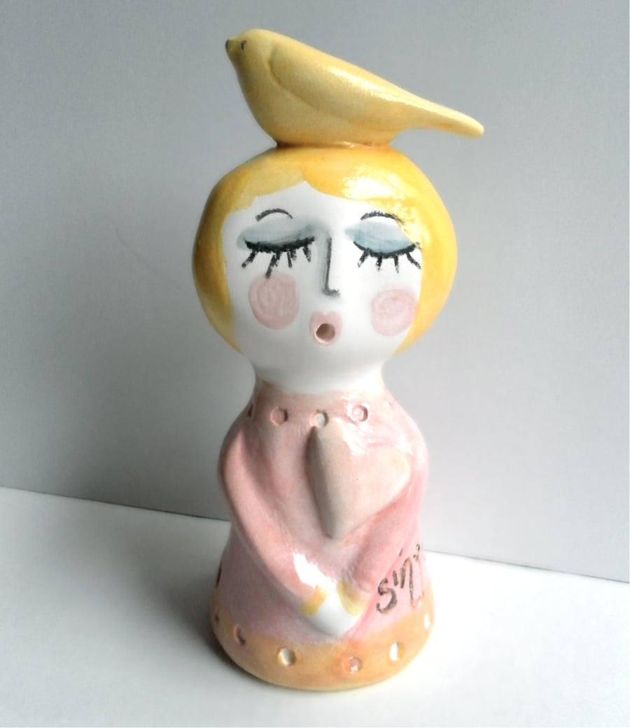 PORCELAIN SINGING GIRL AND CANARY