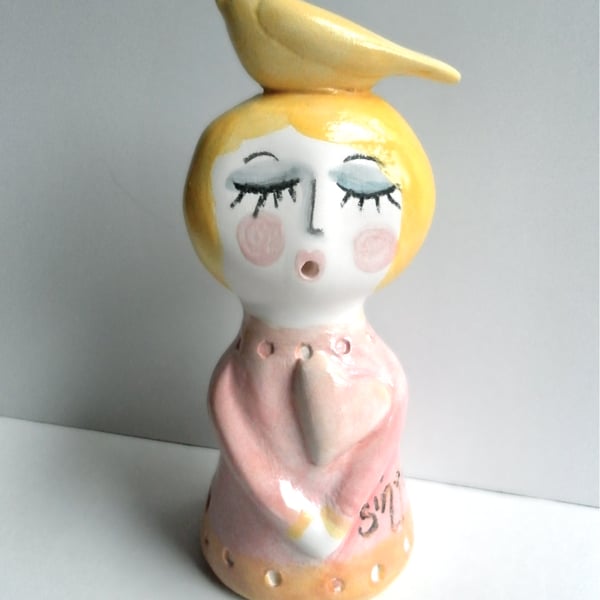 PORCELAIN SINGING GIRL AND CANARY