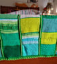 baby and toddler handmade knitted baby blanket in green colourway. - Image 6