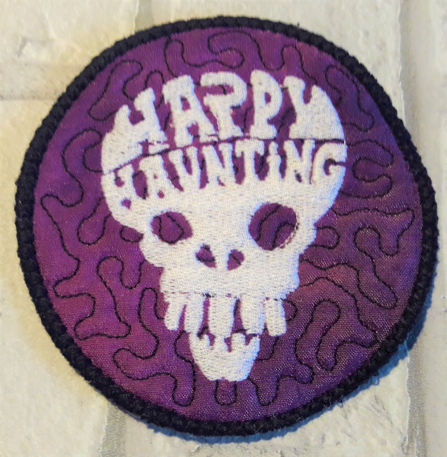 Halloween themed coaster with skull design