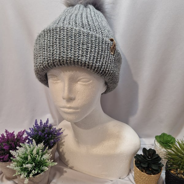 Knitted pompom hat,  small Adult or teanage,  in grey
