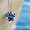 Octopus and flowers necklace, 32mm blue disc pendant, handmade jewellery. 740B