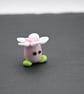 pink glass flower head figure - Image 4