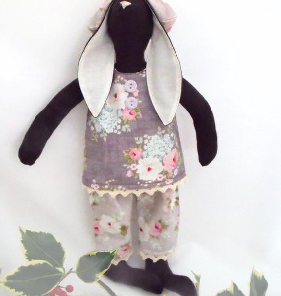 Tilda style brown bunny rabbit doll for display, light grey clothing