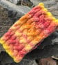 Hand knitted wool headband , featuring Celtic knot pattern.Fleece lined.