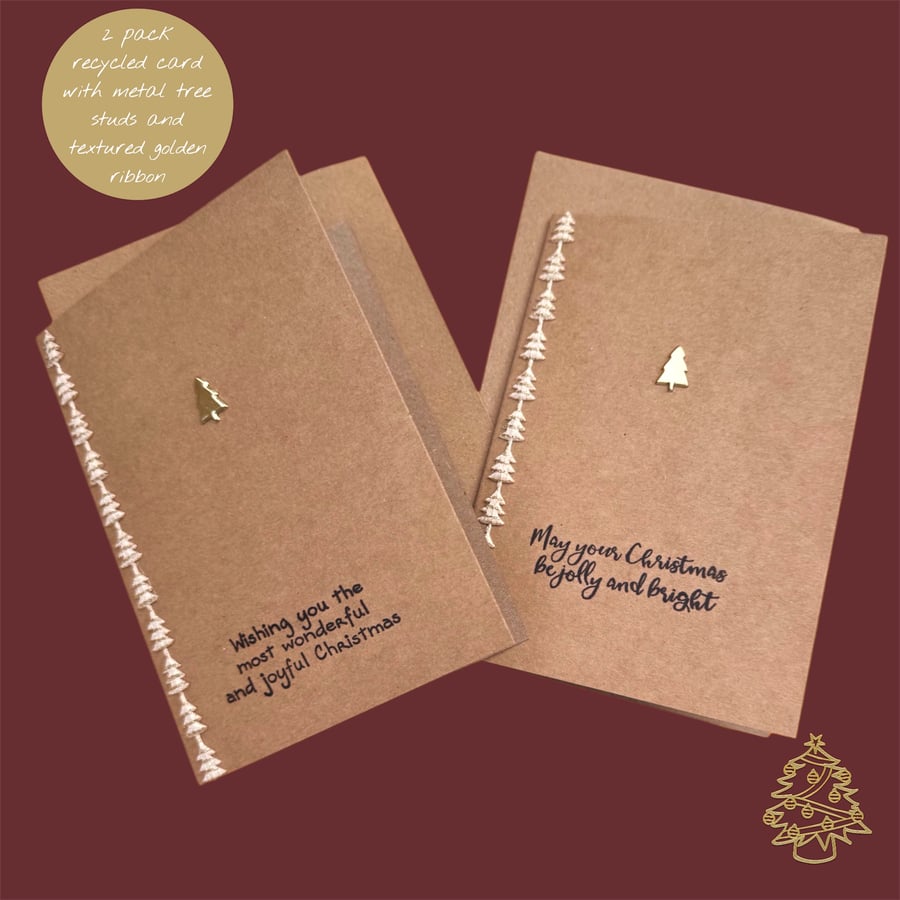 A pair of rustic recycled Christmas cards with golden trees and matching ribbon 