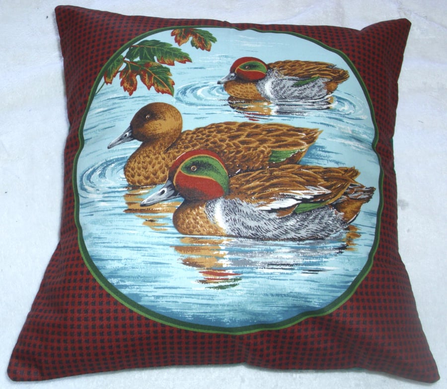 Three Teal paddling cushion