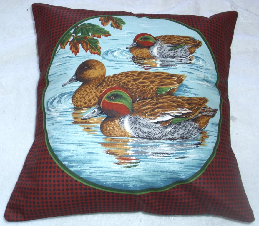Three Teal paddling cushion