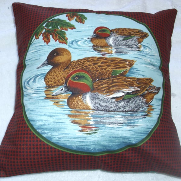 Three Teal paddling cushion