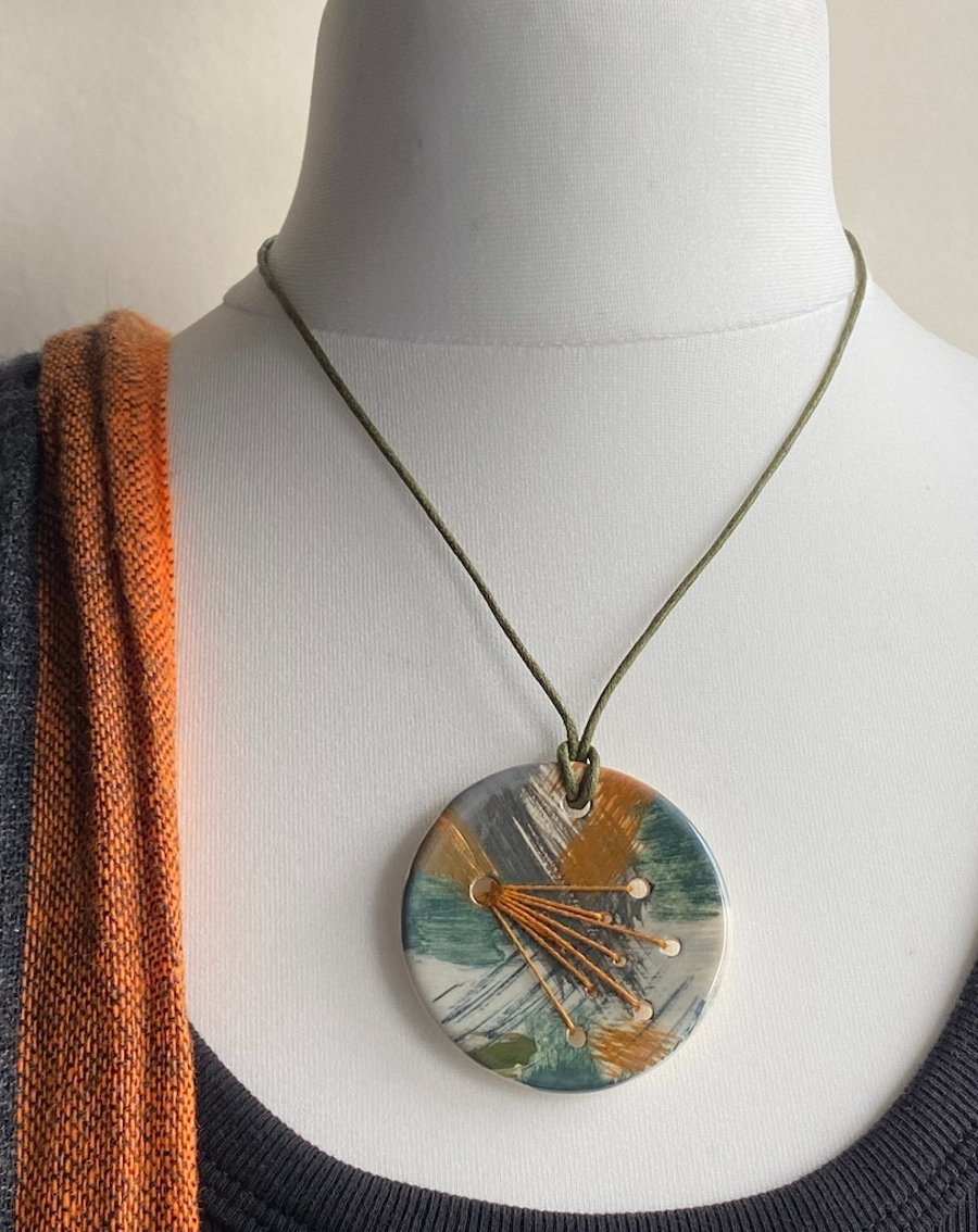 Handmade Ceramic Statement Pendant with Stitched element
