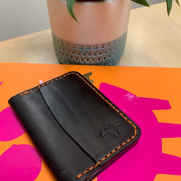 Leather wallet in black bifold slim and lightweight for cards or cash