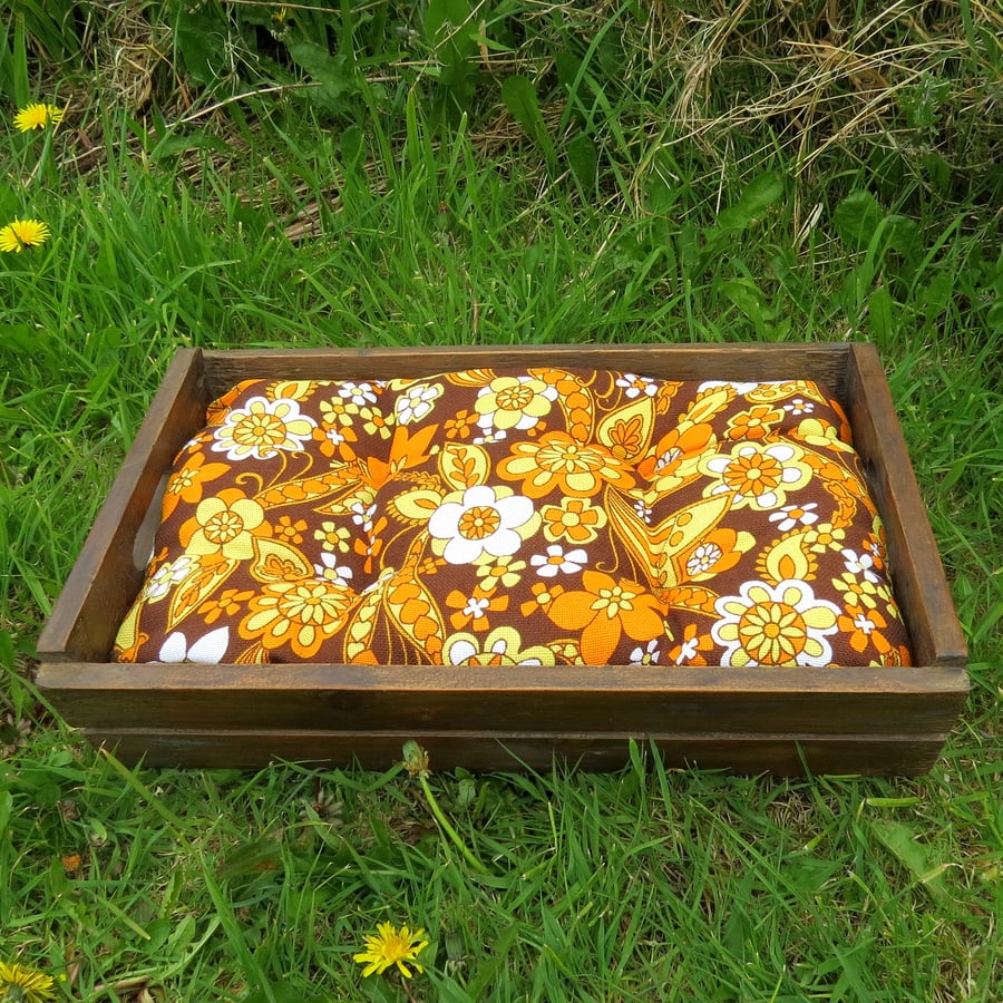 A pet bed for a chihuahua or similar sized dog.  Small cat bed.  