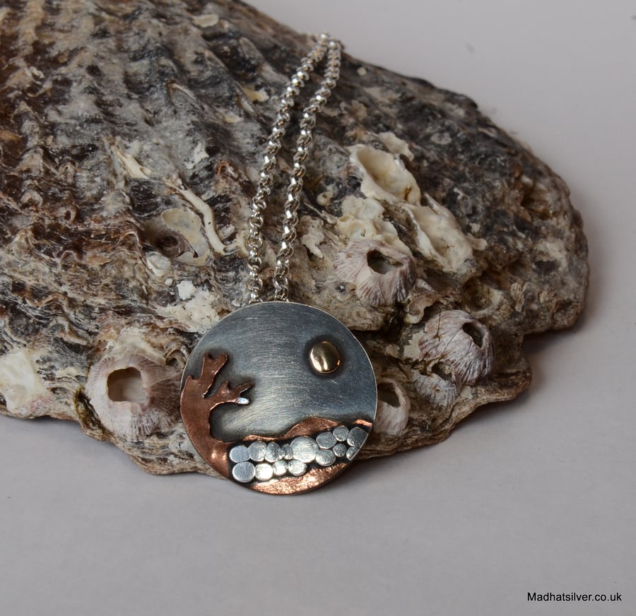 Silver and copper pebble scenic pendant