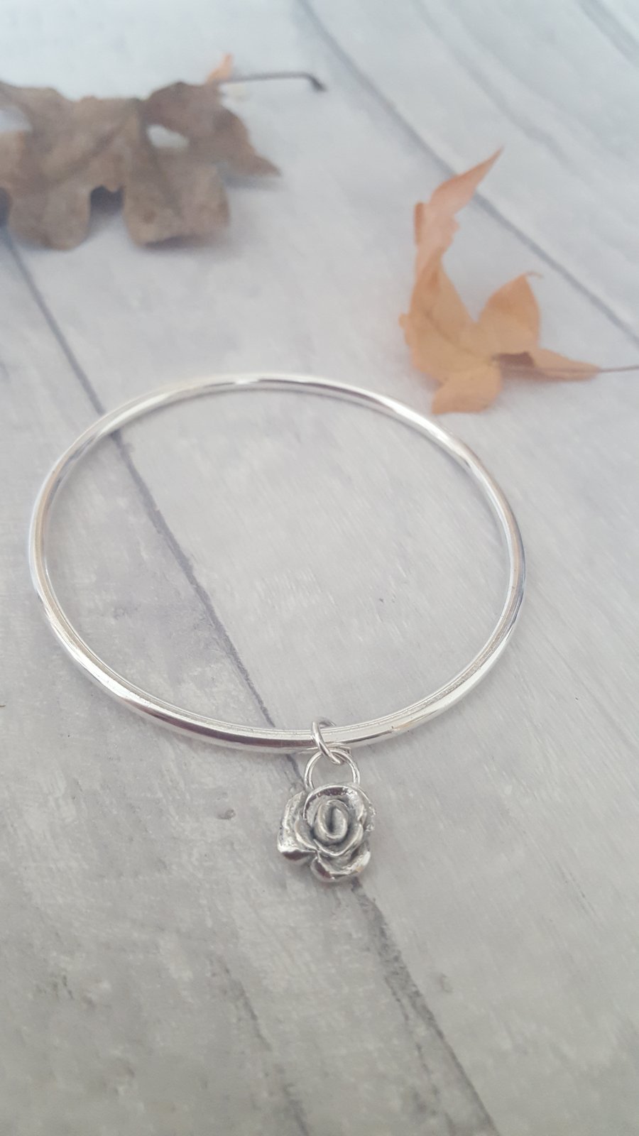 Solid silver rose bangle