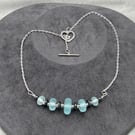 blue seaglass style lampwork glass disc necklace