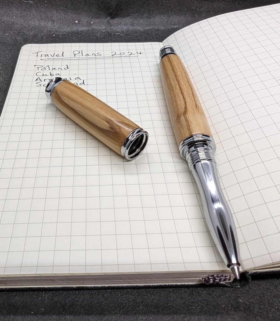 A rollerball pen in olive wood