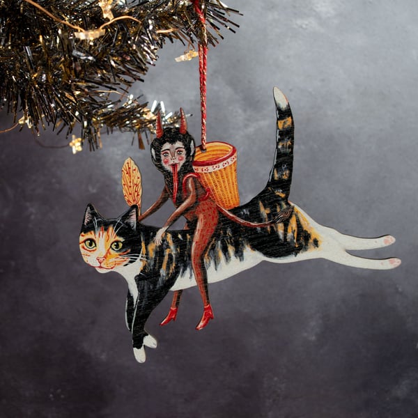 Christmas Krampus on a cat hanging decoration. Made from laser cut wood