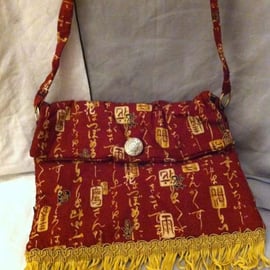  Small red chinese character print bag with gold trim