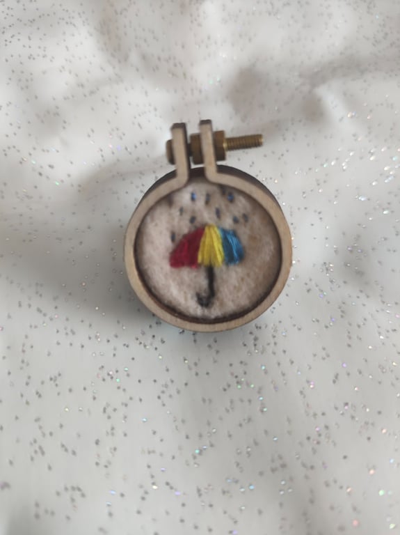 Umbrella hoop pin badge